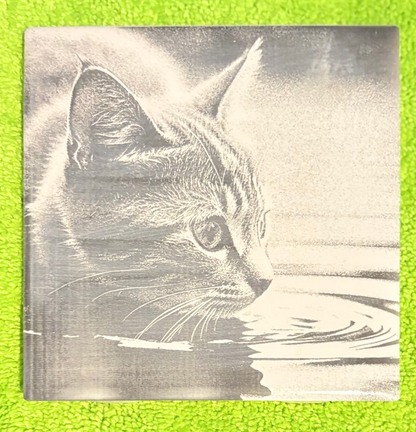 Laser engraved tile cat