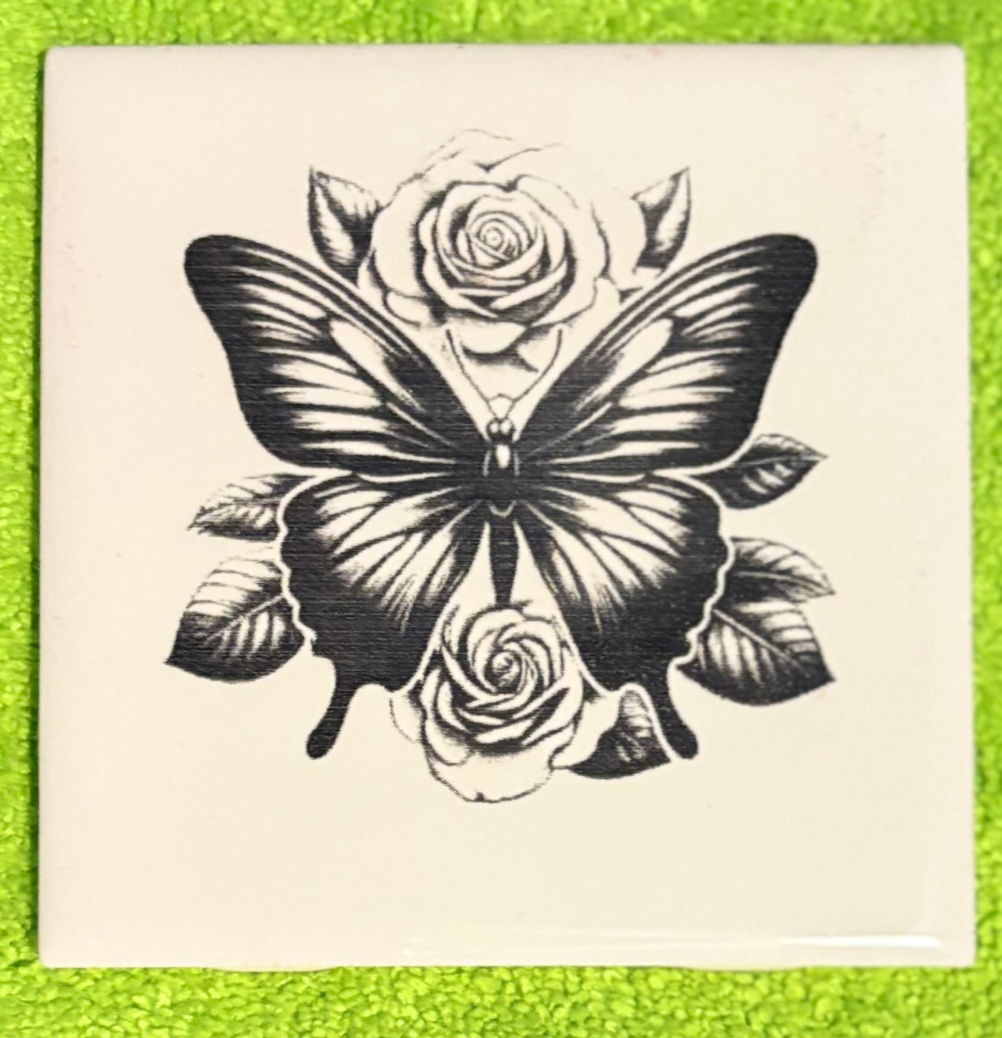 Laser engraved tile butterfly